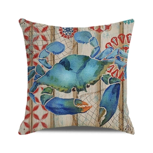Detail of blue watercolor crab print on textured cotton linen square pillow cover