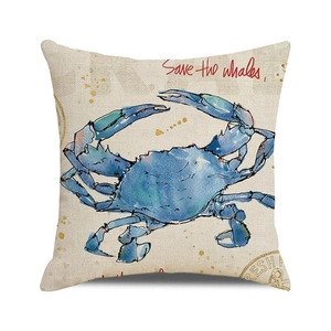 Detail of linen texture and watercolor blue crab print on a square cushion cover
