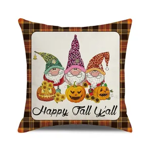 Detail of Happy Fall Y'all pillow cover featuring gnomes with pumpkins and sunflowers