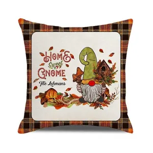 Detail of autumn gnome pillowcase with orange plaid border and Home Sweet Gnome print