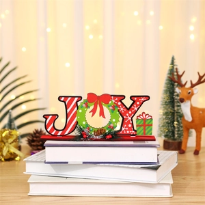 Wooden JOY Christmas table decor with red stripes, wreath and festive pine cone base