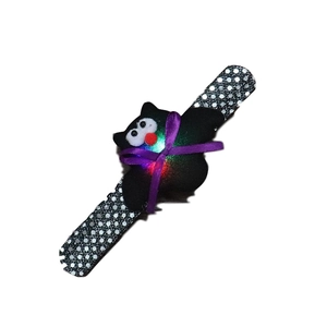 Halloween glowing bat bracelet with LED lights and purple bow on sequin slap band