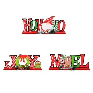 Three-piece Christmas wooden tabletop signs featuring HO HO HO, JOY, and NOEL holiday slogans