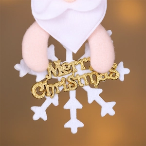 Detail of plush Christmas tree ornament with golden Merry Christmas text and snowflake base
