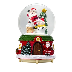 Musical Christmas snow globe with Santa Claus, snowman, and tree on red house base