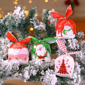 Christmas drawstring gift bags with bunny ears featuring Santa Claus and snowman patterns