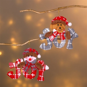 Detailed view of plush Christmas bear and snowman ornaments with JOY letter design