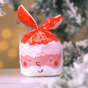 Close-up of Santa Claus gift bag with rabbit ear design and Merry Christmas text