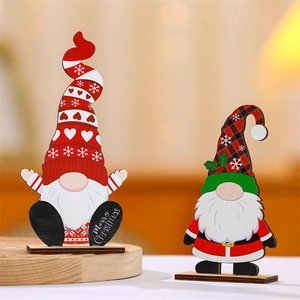 Christmas wooden gnome ornaments with Merry Christmas text and festive patterns on bases