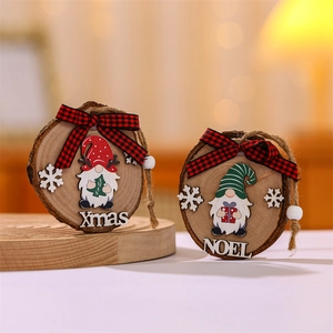 Wooden Christmas gnome pendants with Xmas and Noel letters on a rustic tray
