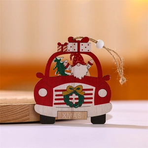 Macro shot of a wooden red Christmas truck ornament with XMAS text and a small tree