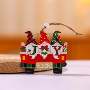 Detail of wooden Christmas gnome truck hanging ornament with JOY letters and white wood bead