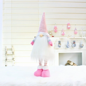 Detailed view of pink and white plush Christmas gnome with adjustable telescopic legs