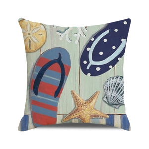 Detail of beach themed square pillowcase with seashell and flip-flop print on linen texture