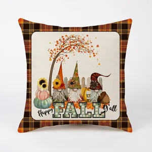 Detail of Happy Fall Y'all pumpkin gnome cushion cover with orange buffalo plaid borders