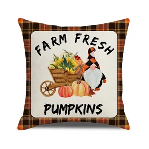 Detail view of cotton linen pillow cover with gnome pumpkin and sunflower harvest print