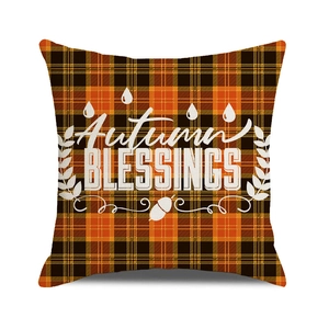 Detail of Autumn Blessings orange and black plaid pillowcase with acorns and leaves