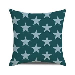 Détail de la texture d'une housse de coussin sarcelle foncée à motifs d'étoiles