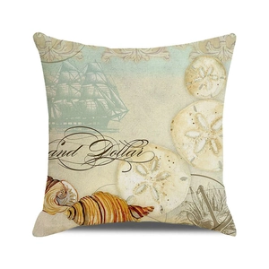 Détail macro de housse de coussin vintage avec motif imprimé de dollar de sable et coquillage