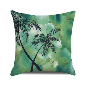 Dettaglio copricuscino quadrato in cotone e lino con pittura a olio di palme tropicali verdi