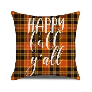 Macro detail of Happy Fall Y'all orange plaid pillow cover showing rustic fabric texture