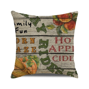 Detail van linnen kussenhoes met herfst pompoen ontwerp en vintage textuur