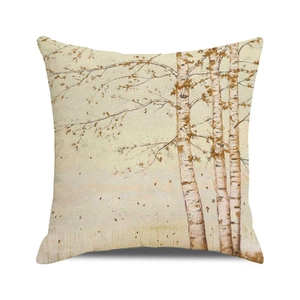 Close-up of square cushion cover showing autumn birch forest print on cotton linen fabric