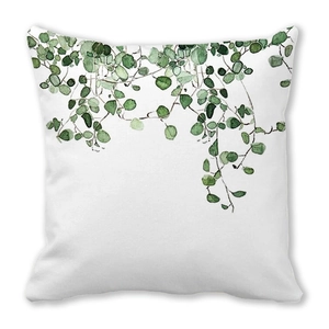 Detail of tropical green leaf watercolor pattern on white peach skin pillowcase