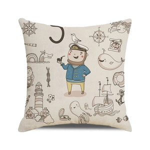 Close-up of nautical watercolor cushion cover with linen texture and anchor patterns
