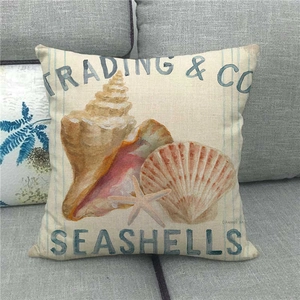 Marine life pillow cover with starfish and seashell patterns on a linen texture