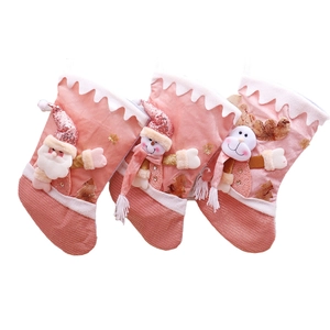Pink Christmas stockings set with 3D Santa, Snowman and Reindeer figurines