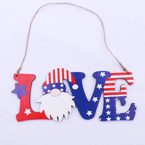Detail of wooden LOVE sign with USA patriotic gnome and stars and stripes design