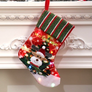 Large LED lighted Christmas stocking with reindeer pattern and snowflake embroidery