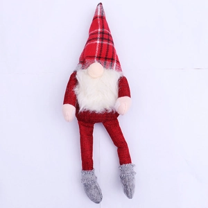 Detail of Christmas long-legged gnome with red plaid hat and white faux fur beard