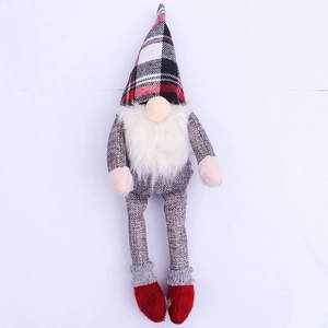 Detail showing plush Christmas gnome bottle topper with plaid hat and white beard