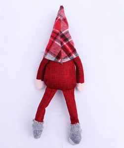 Close-up of a Christmas gnome wine bottle cover with red burlap and plaid fabric details
