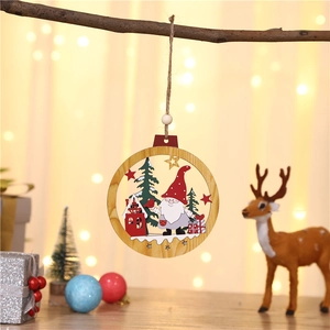 Festive wooden gnome ornament hanging on a tree branch with warm bokeh background lights