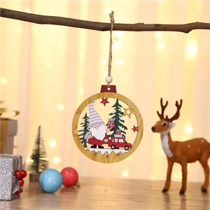 Wooden Christmas ornament featuring Santa in a car, hanging on a branch with bokeh lights