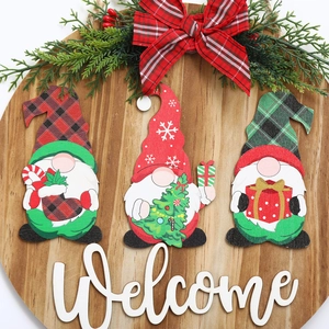 Round wooden Christmas welcome sign with three gnomes and green plants for door decor