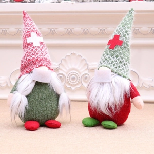 Pair of Christmas faceless gnomes with masks and checkered hats for holiday home decor