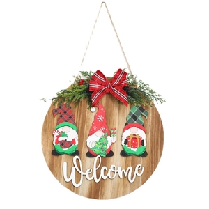 Christmas round wooden welcome sign with festive gnomes, plaid bow, and pine needles