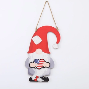 Detail of wooden gnome ornament with patriotic USA flag heart and rustic jute rope