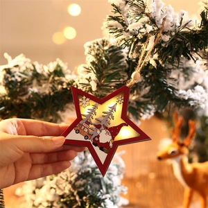 Star-shaped wooden Christmas LED pendant featuring a Santa scene and warm glow