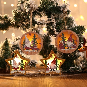 Lighted wooden Christmas ornaments with forest gnome and snowflake cutout patterns