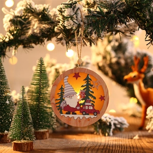 Close-up of a circular wooden Christmas gnome ornament with festive xmas carving and hemp rope