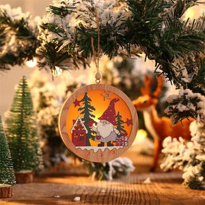 Close-up of wooden Christmas gnome ornament with warm LED lights and hollow carved details