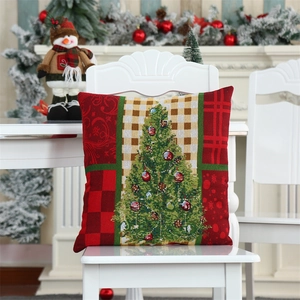 Detail of Christmas gnome pillowcase featuring festive plaid patterns on a white chair