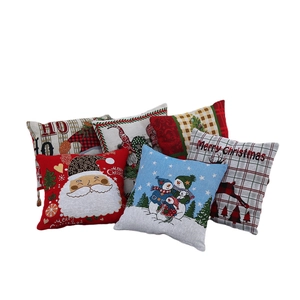 Christmas cushion covers set featuring Santa and reindeer designs in red and beige tones