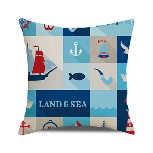 Detailed close-up of a nautical theme pillow case with anchor and sailboat prints