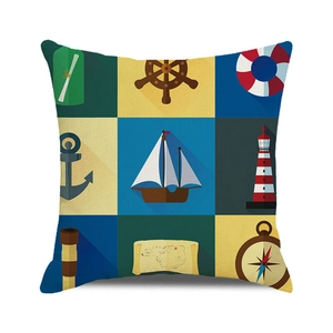 Detail shot of square nautical pillowcase with watercolor anchor and sailboat patterns